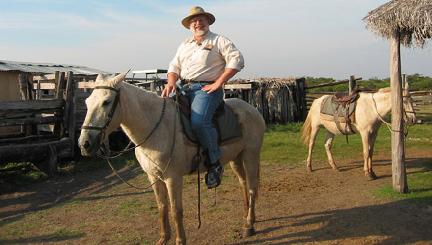 Steve on horseback in Brazil, 2003