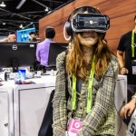 Woman wearing a virtual reality headset.